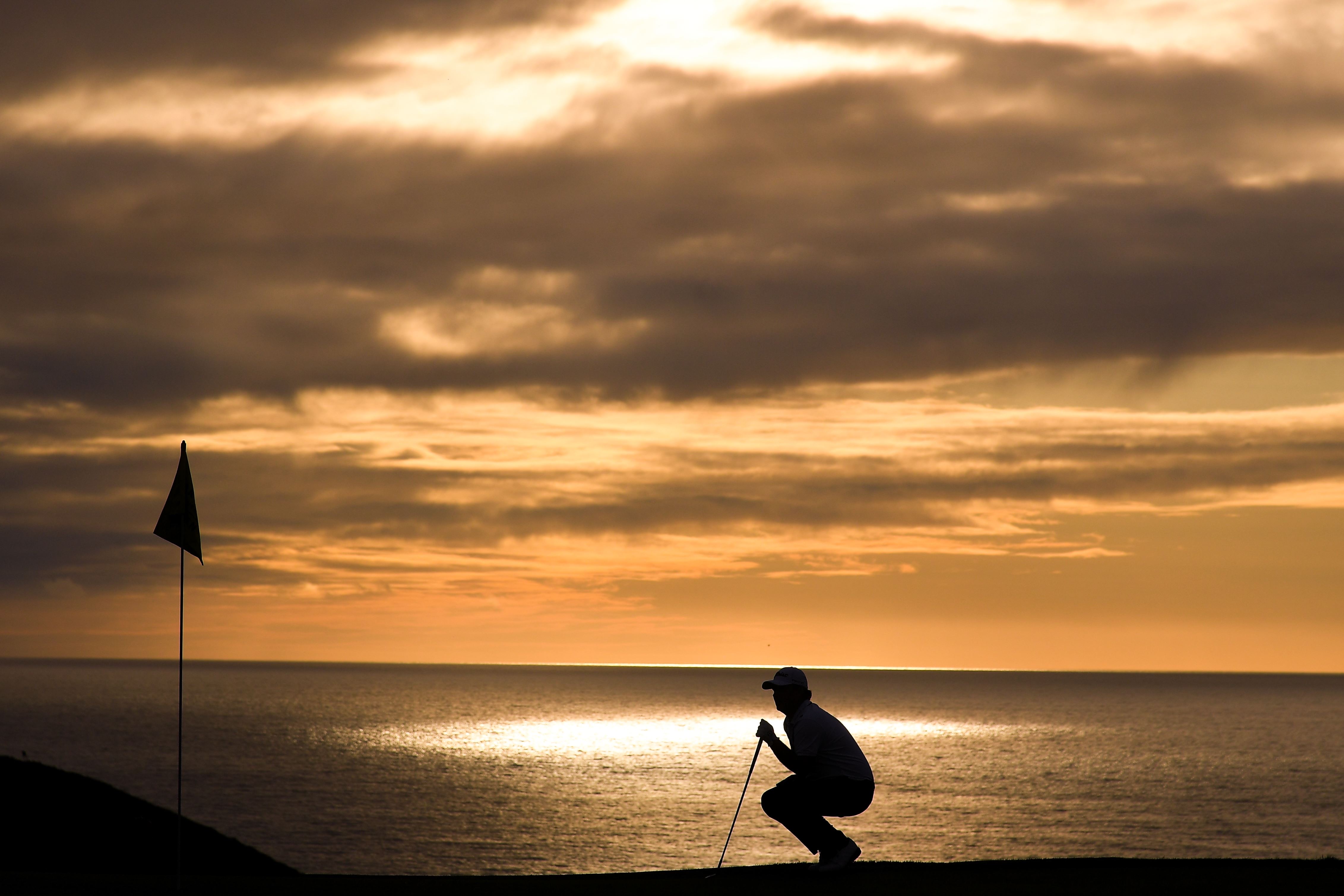 Patrick Reed silhouette at sunset